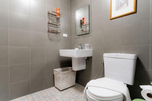 a bathroom with a white toilet and a sink at Hua Hin La Casita Beautiful Two Bedroom Condo With Great Views in Hua Hin