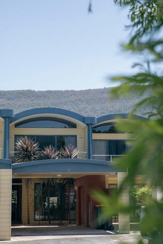 a large house with plants on the top of it at Halls Gap Escape Townhouses in Halls Gap