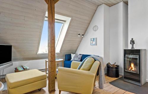 Televiisor ja/või meelelahutuskeskus majutusasutuses Cozy Apartment In Nordborg