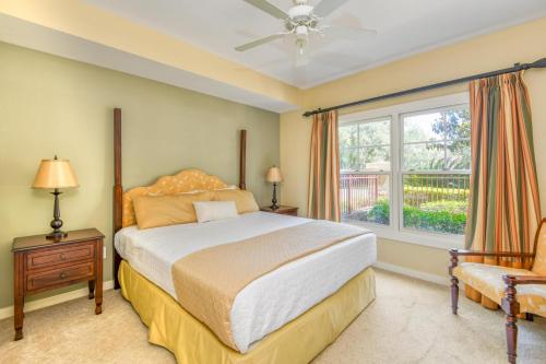 a bedroom with a bed and a window at 4106-1 Cozy Ground Floor 1 BR with fenced patio in Saint Augustine