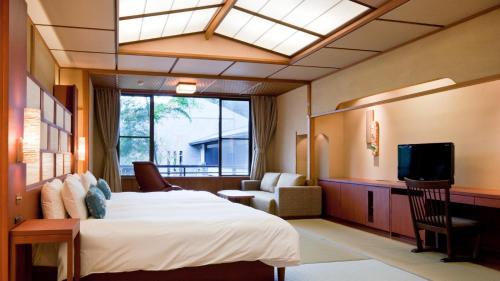 TV a/nebo společenská místnost v ubytování Tofuya Resort&Spa-Izu