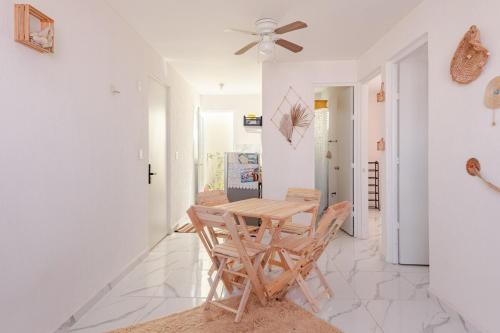 a dining room with a table and chairs at Hippie Artisan Jungle Flat Pool in Tulum