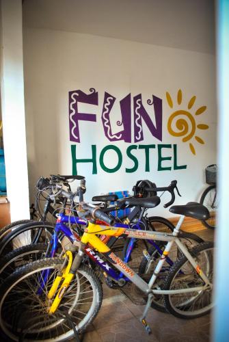 a group of bikes parked next to a sign at Cabo Frio Fun Hostel in Cabo Frio