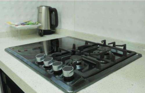 Kuchyň nebo kuchyňský kout v ubytování Kobbies Studio