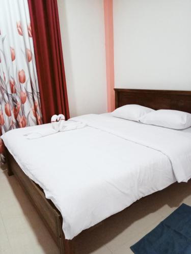 Postel nebo postele na pokoji v ubytování Uduwara Holiday Home
