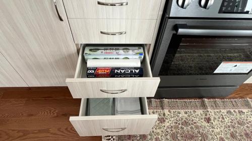 a kitchen with three drawers and an oven at Entire Home in Lake of Bays -Huntsville Muskoka Algonquin in Dwight