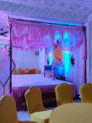 Ένα ή περισσότερα κρεβάτια σε δωμάτιο στο Sana Guest House
