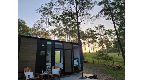 Jardín al aire libre en Firefly Tiny House by Tiny Away