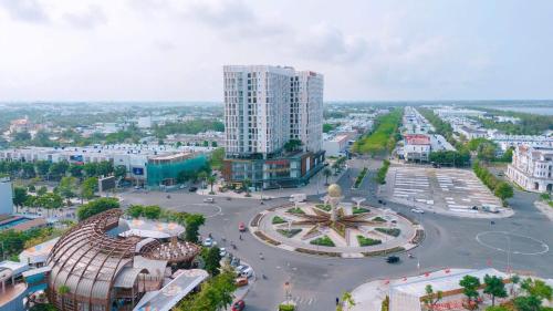 an aerial view of a city with a building at Sophia Center - Serviced Apartment - Duke Hospitality in Rach Gia