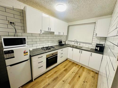 Kuchyň nebo kuchyňský kout v ubytování Second Home