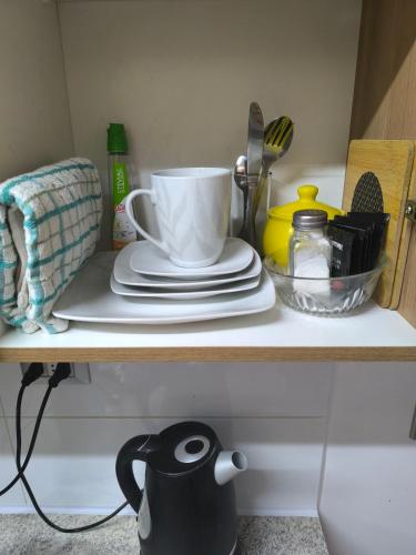 Παροχές για τσάι/καφέ στο Habitación individual con baño privado