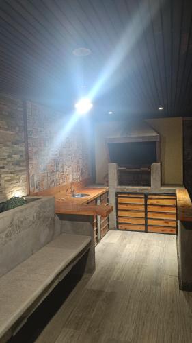 Χώρος καθιστικού στο Habitación individual con baño privado