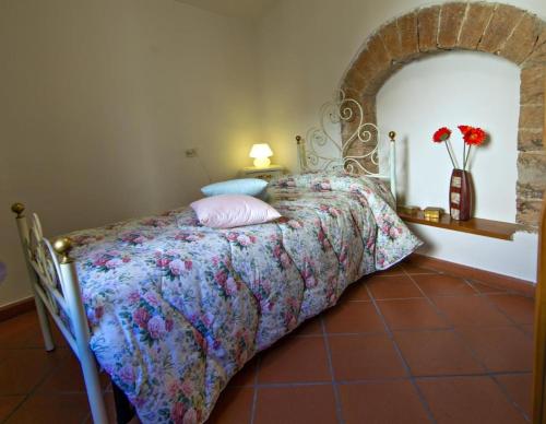Postel nebo postele na pokoji v ubytování Casa Flora