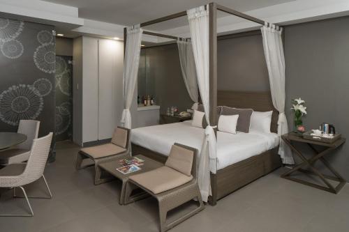 Cama o camas de una habitación en Astoria Boracay