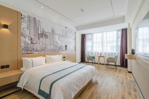 Postel nebo postele na pokoji v ubytování City Comfort Inn Hefei 1912 Ganghui Plaza