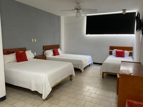 Postel nebo postele na pokoji v ubytování Hotel Sicilia Italia