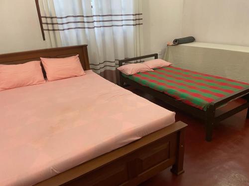 Postel nebo postele na pokoji v ubytování Aurea Galle