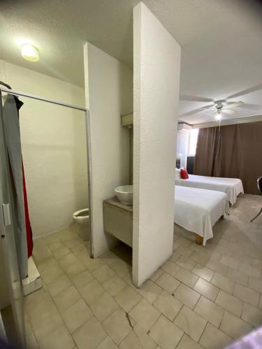 Postel nebo postele na pokoji v ubytování Hotel Sicilia Italia
