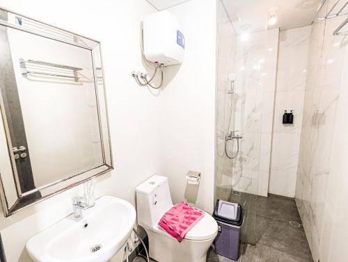 Ένα μπάνιο στο Lovina 23-AB at One Residence near Ferry Terminal