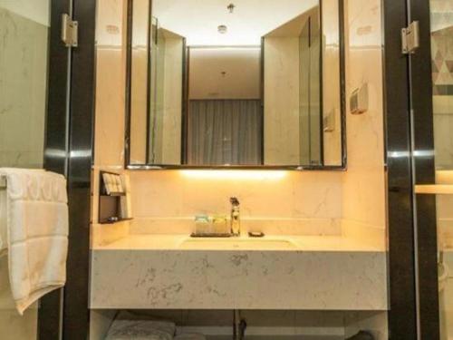 Koupelna v ubytování Borrman Hotel Guangzhou Southern Hospital Meihuayuan Metro Station