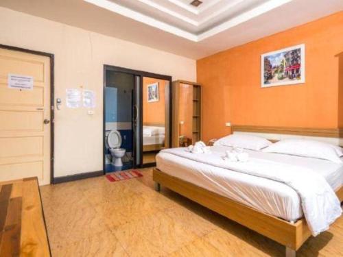 Postel nebo postele na pokoji v ubytování Prew Lom Chom Nam Resort