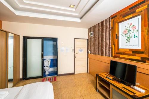 Postel nebo postele na pokoji v ubytování Prew Lom Chom Nam Resort