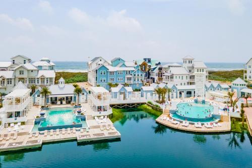 an aerial view of a resort with a body of water at Seashells to Sandcastles 156 BAR in Mustang Beach