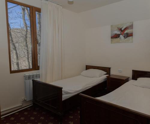 Postel nebo postele na pokoji v ubytování Park Resort Aghveran