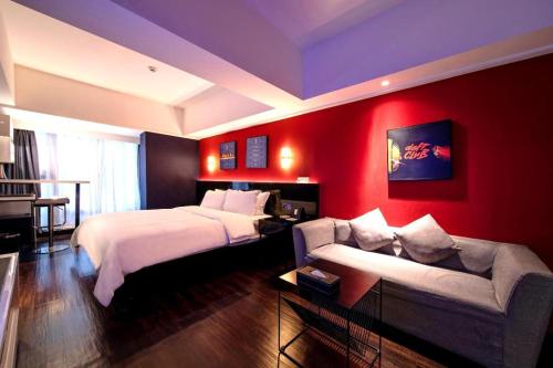 Letto o letti in una camera di M Hotel Shenzhen Nanshan
