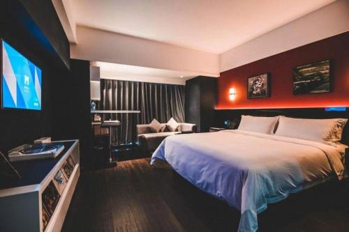 Letto o letti in una camera di M Hotel Shenzhen Nanshan