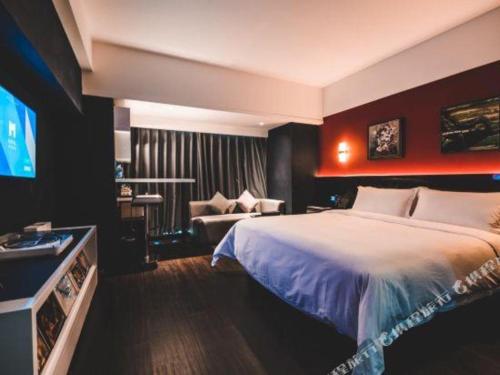 Letto o letti in una camera di M Hotel Shenzhen Nanshan