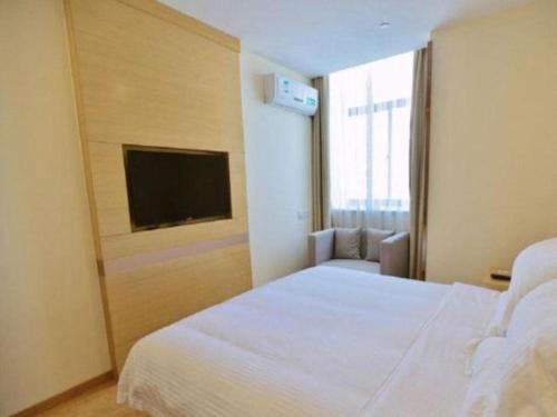 Katil atau katil-katil dalam bilik di GreenTree Inn Shanghai National Convention and Exhibition Center Huaxiang Road