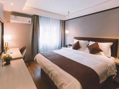 Katil atau katil-katil dalam bilik di GYA Shanghai Jiangpu Hotel