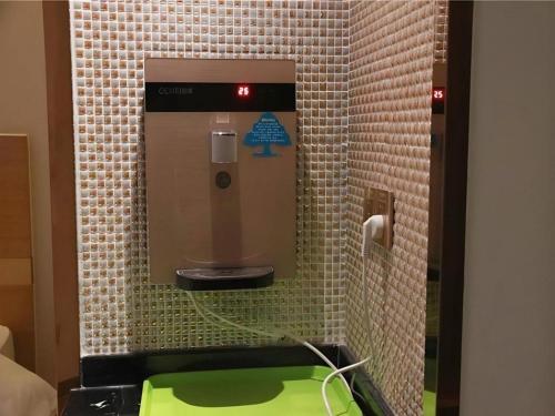 Ένα μπάνιο στο GreenTree Inn Maanshan Hanshan District Jiuwu Square Hotel
