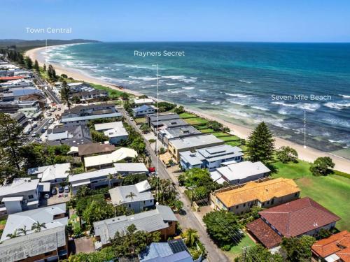 an aerial view of a beach with houses and the ocean at Rayner's Secret in Lennox Head