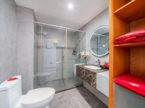 Ένα μπάνιο στο GreenTree Inn Taizhou Gaogang District Business Hotel