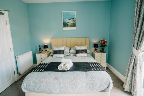 Cama o camas de una habitación en OYO Minerva Guesthouse
