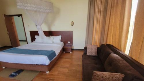 Ένα ή περισσότερα κρεβάτια σε δωμάτιο στο Yiganda Hotel, Bahir Dar