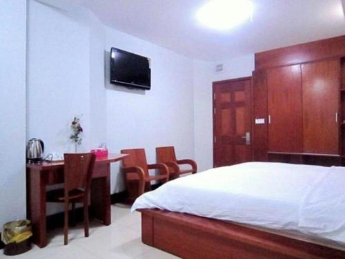 Μια τηλεόραση ή/και κέντρο ψυχαγωγίας στο An Dong Center Hotel Chinatown Saigon