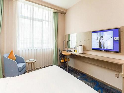 Кровать или кровати в номере Holiday Inn Express Lhasa Potala Square By IHG