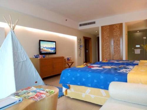 TV a/nebo společenská místnost v ubytování Man Wan Harmona Resort