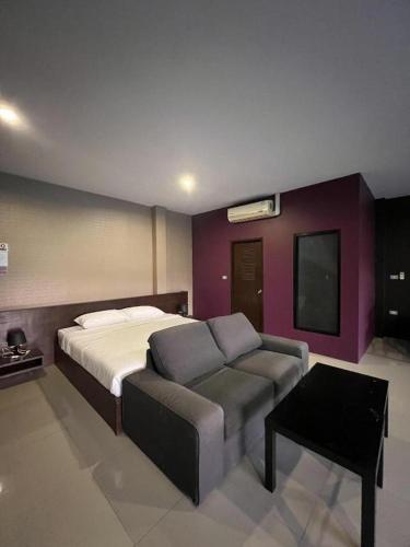 Katil atau katil-katil dalam bilik di Nangfa Mini Hotel