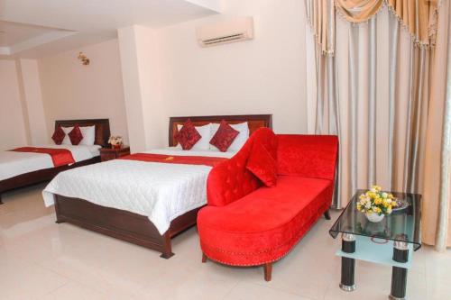 Кровать или кровати в номере Ngoc Giau Hotel