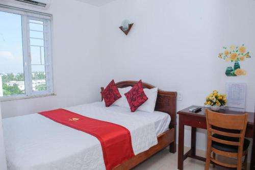 Кровать или кровати в номере Ngoc Giau Hotel