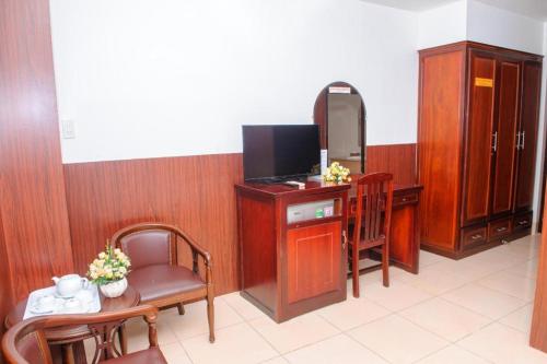 Телевизор и/или развлекательный центр в Ngoc Giau Hotel