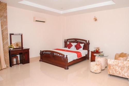 Кровать или кровати в номере Ngoc Giau Hotel