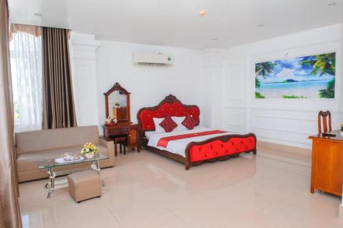 Кровать или кровати в номере Ngoc Giau Hotel