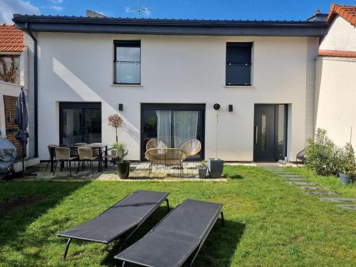 Maison spacieuse avec jardin