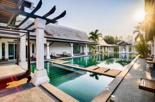 an image of a swimming pool at a villa at Ocean Breeze Residence in Khao Lak
