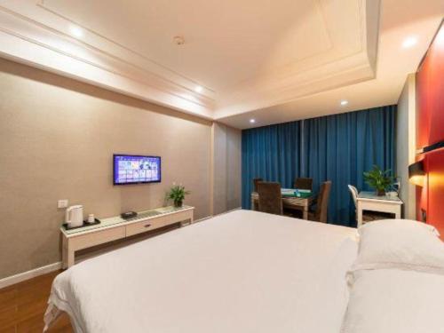 Letto o letti in una camera di mingjia hotel